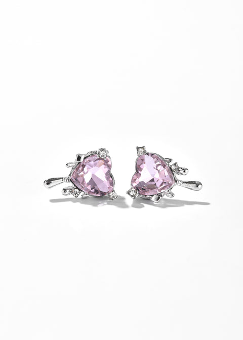 Heart stud earrings with a central pink gemstones surrounded by small, clear crystals.