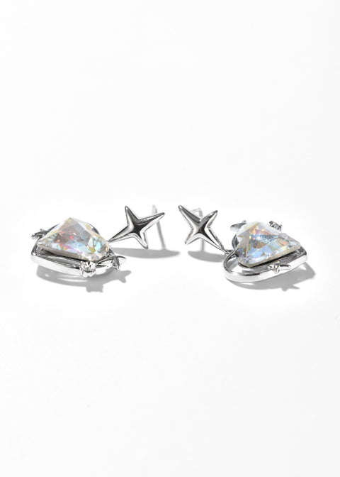 Puffed Heart earrings featuring reflective clear crystal and small star accents.