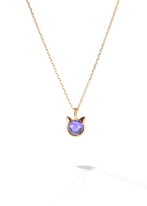 An amethyst pendant necklace set in a cat-shaped frame, hanging from a gold chain.