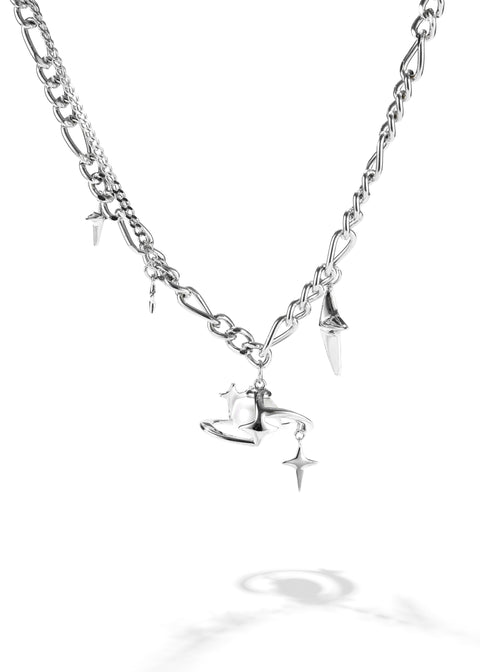A gold plated chain with pearl pendant necklace, consists of a couple of stars, and a pearl in the middle as if it is a planet with rings.