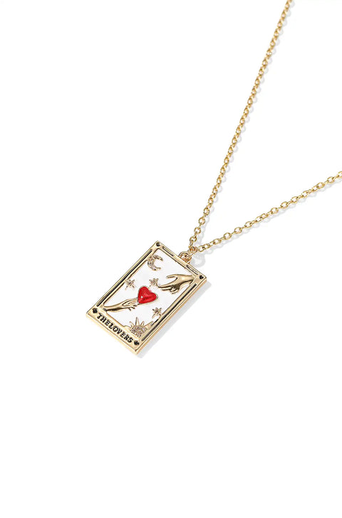 A tarot card necklace featuring a rectangular pendant inscribed at the bottom.