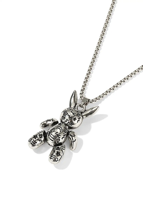 A rabbit necklace with a textured, silver rabbit pendant hanging on a slender chain.