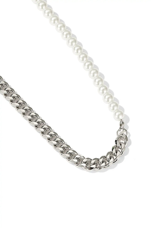 This half Cuban half pearl necklace features alternating sections of metal links and white pearls.