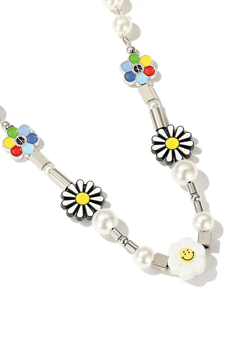 This colorful beaded necklace features flower charms, smiley faces, and shiny pearls.