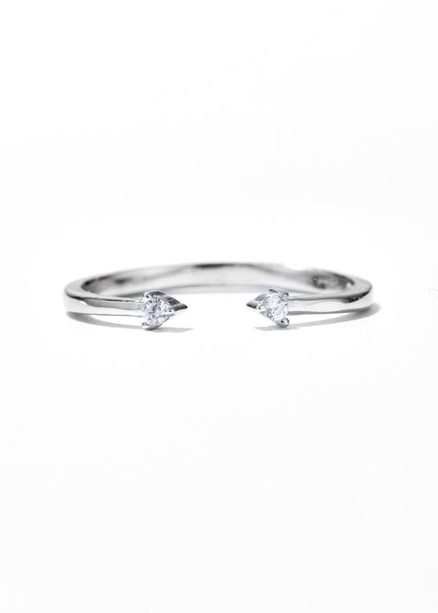 Double Heart Sparkling Ring with open design, and diamond set at each tip.