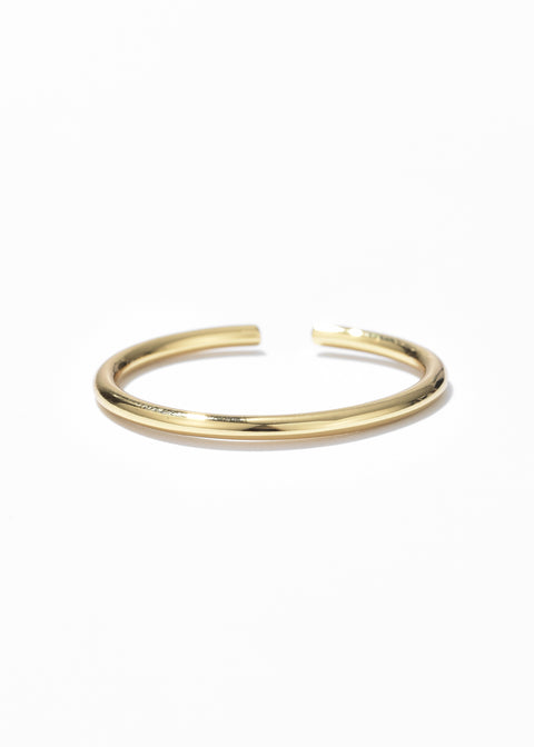 A gold band ring design with sleek, shiny finish.