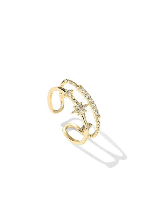 A gold open-ended star ring featuring three star embellishments.