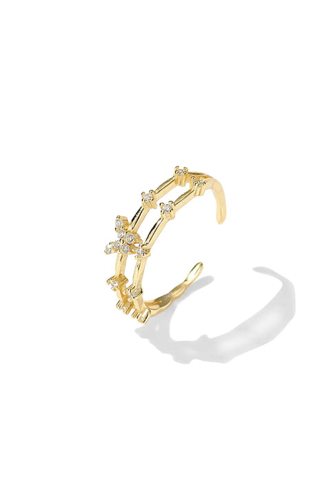 A sterling silver butterfly ring with butterfly motif accented by small stones.