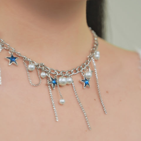 Star Chain Necklace with silver stars and white pearl deangles.