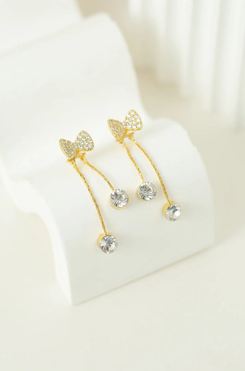 gold bow earrings