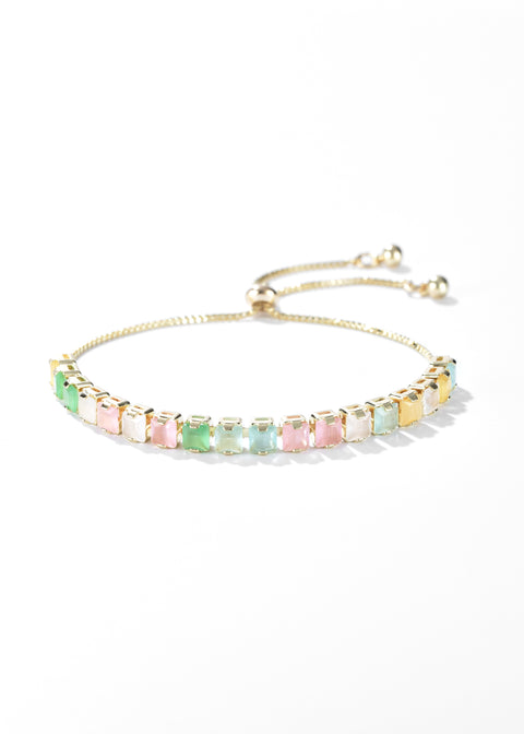 A golden bracelet with pastel-colored, square-cut stones, and has an adjustable clasp.