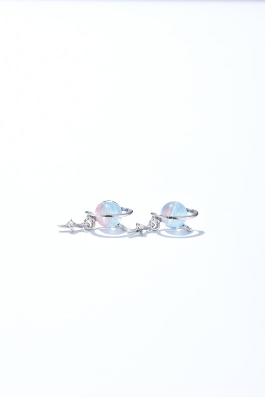 Stud dangle earrings with opal set in a silver ring finished with tiny silver star hanging below.