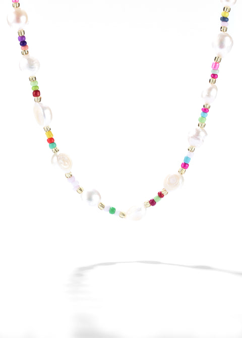 Natural pearl necklace with small, colorful beads, and gold-tone spacers.