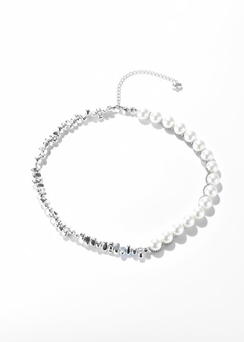 A bead necklace with silver beads and glass pearls.