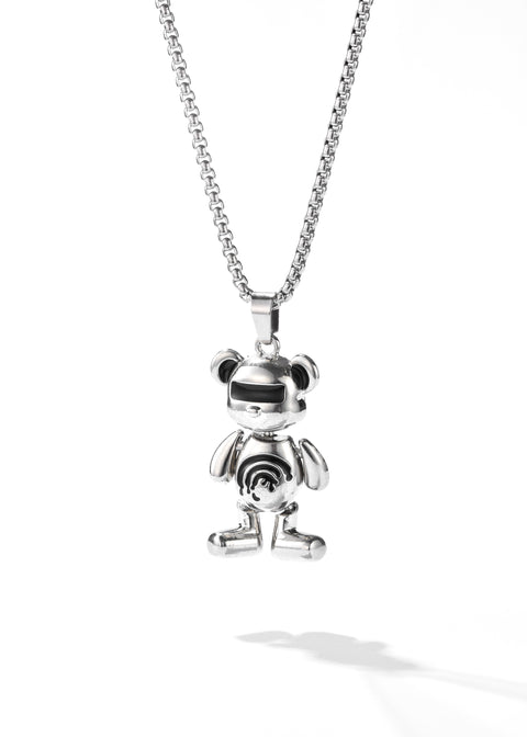 A silver necklace chain with bear pendant stylized like a robot.