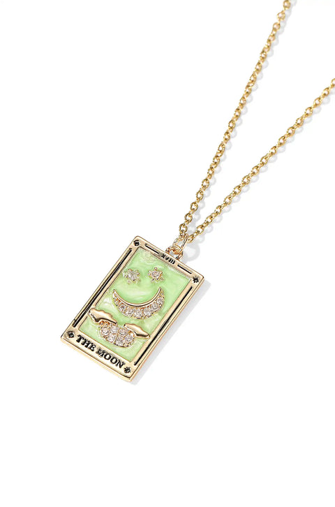 A tarot card necklace featuring a rectangular pendant inscribed at the bottom.