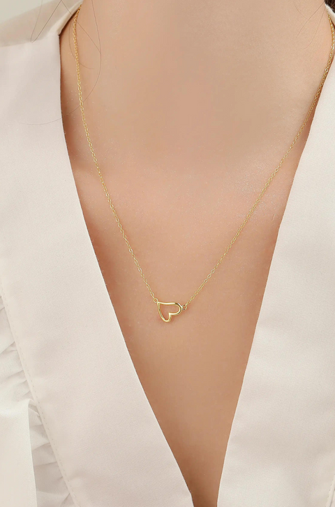 A floating heart necklace with a distinct heart pendant on a simple chain.