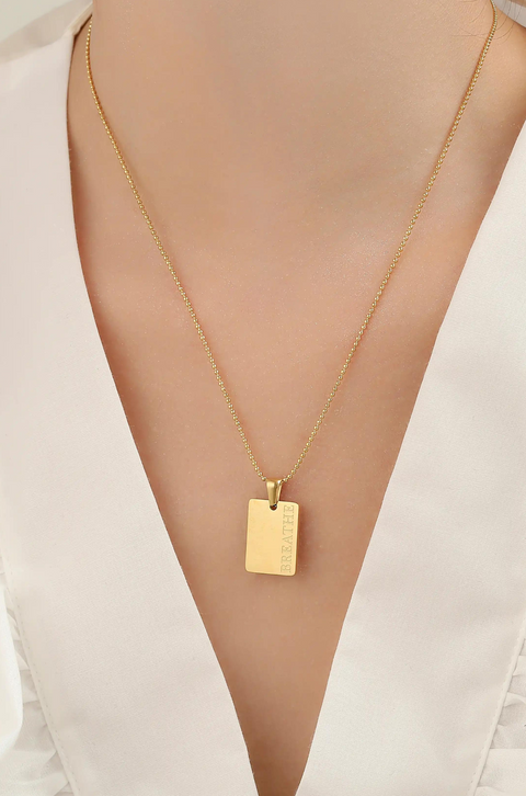 gold necklace with pendant