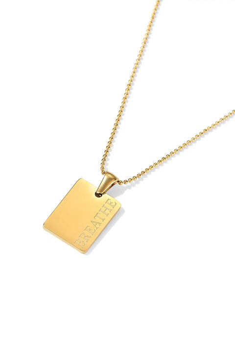 gold necklace with pendant