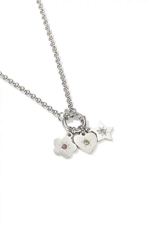 A cosmic cluster necklace featuring a mix of charms including a heart, a star, and a flower.