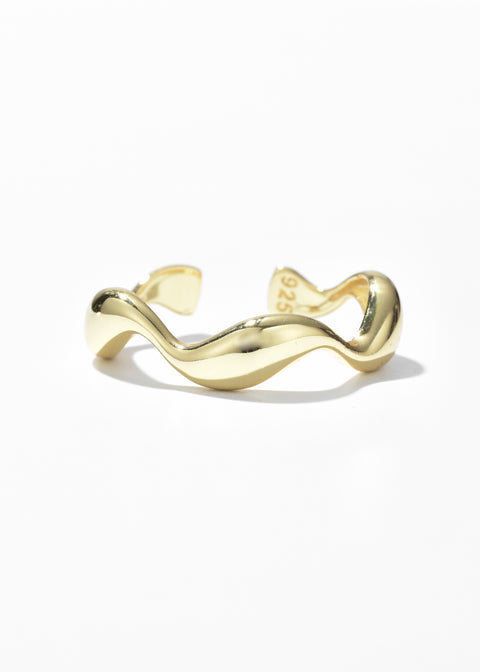 Twisted ring crafted in a gold tone with an open-ended structure.