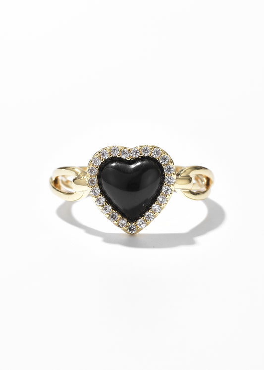 A black heart ring encircled by tiny sparkling clear crystals.