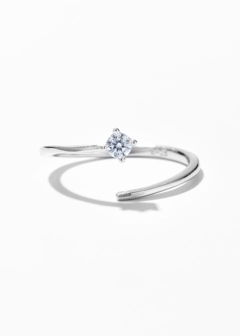 Solitaire diamond ring with open design.