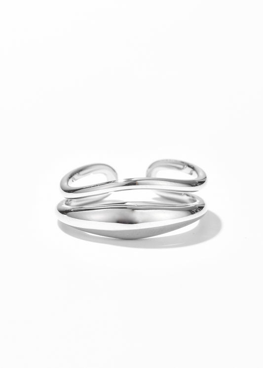 A dare ring with a smooth, reflective finish in a double band ring.