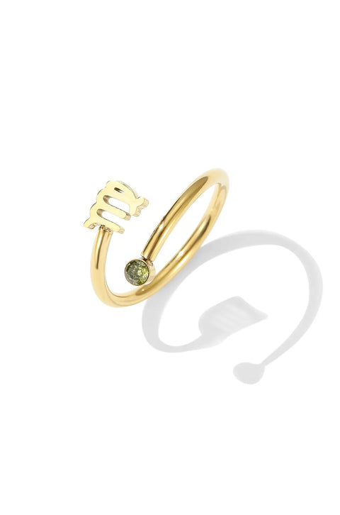 A Virgo ring with the zodiac symbol and a single stone set at the open end.
